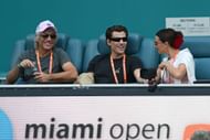 Jovi, from left, Jake Bonjovi, and Millie Bobby Brown are seen during the women's semifinals match at the Miami Open on March 27, 2025, at Hard Rock Stadium in Miami Gardens, Florida. (Image via Getty)